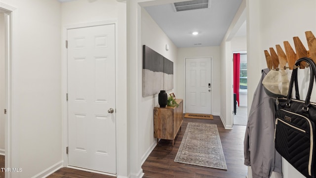 interior space with dark hardwood / wood-style flooring