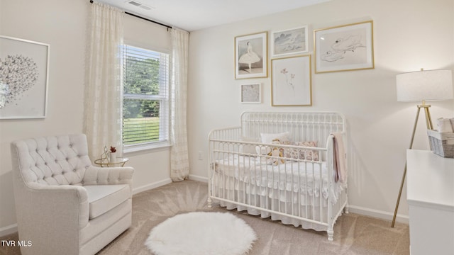 bedroom featuring light carpet