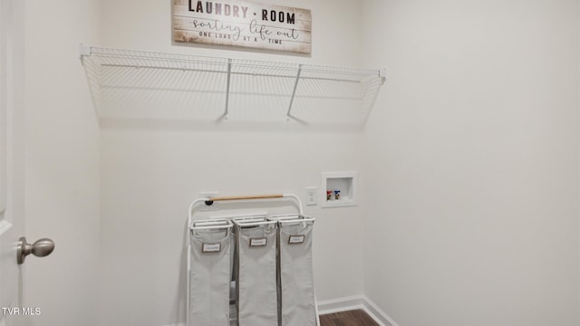 washroom featuring hookup for a washing machine and hardwood / wood-style flooring