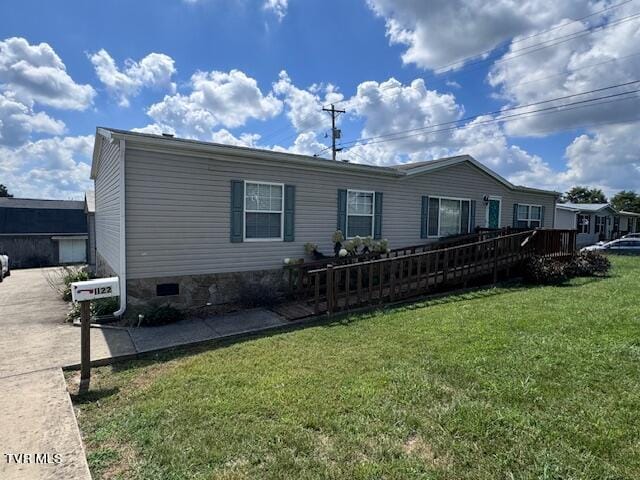 view of front of property with a front lawn