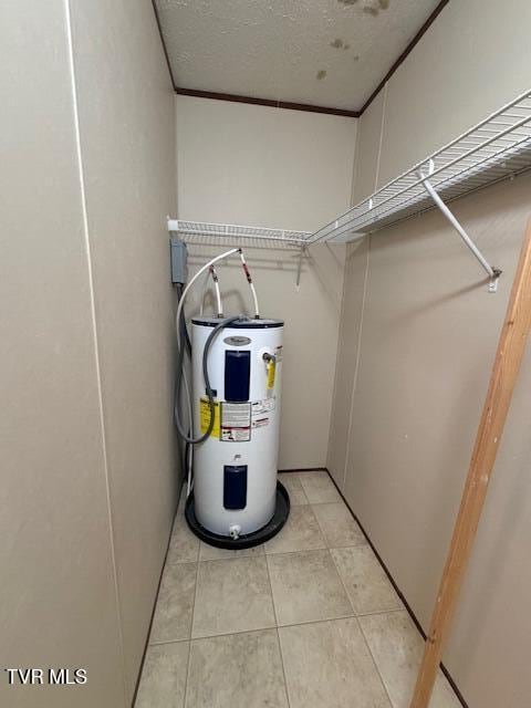 utility room with water heater