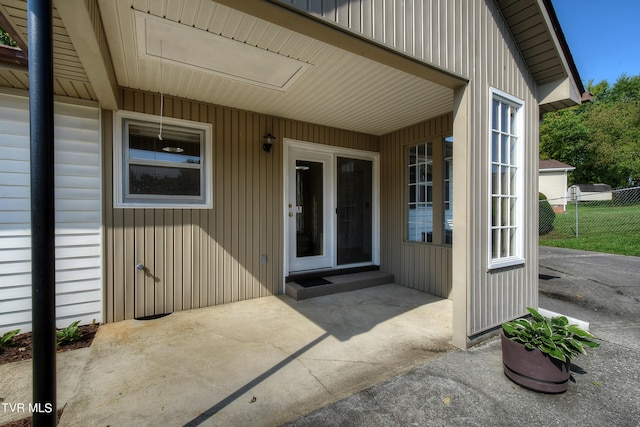 doorway to property featuring a patio area