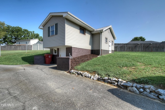 view of property exterior featuring a yard