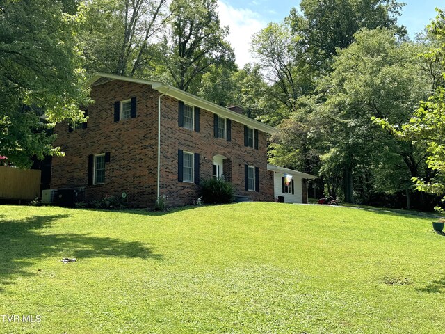 colonial house with a front lawn