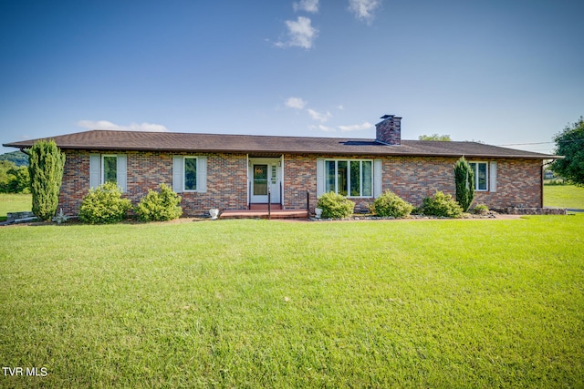 single story home with a front lawn