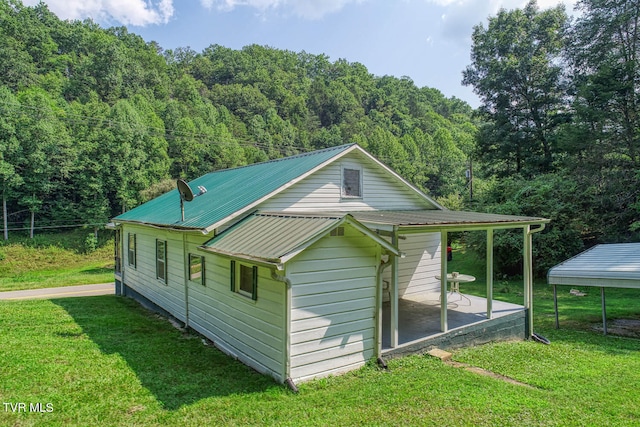 exterior space with a yard