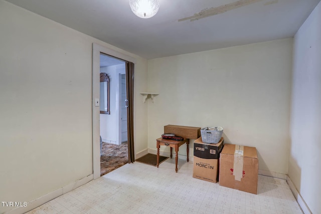 miscellaneous room with light tile patterned flooring