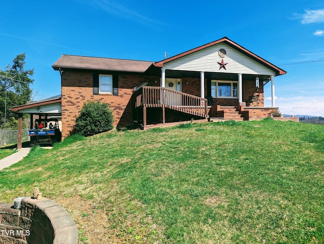 ranch-style home with a carport, covered porch, and a front lawn