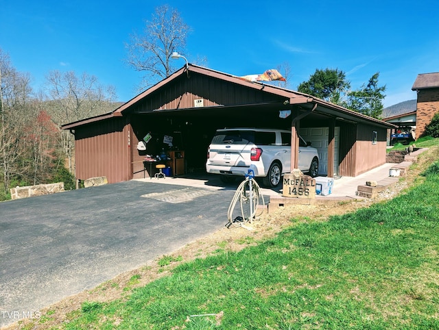 exterior space featuring a garage and an outdoor structure