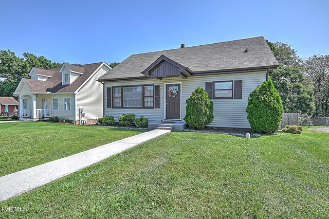 view of front of house with a front lawn