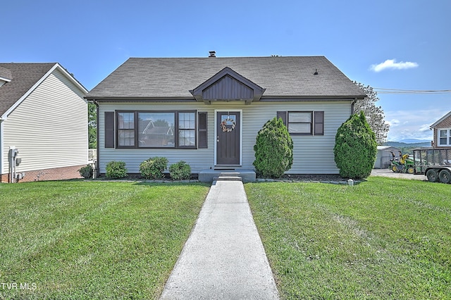 bungalow with a front yard