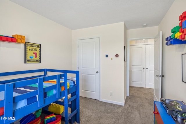 bedroom with light colored carpet