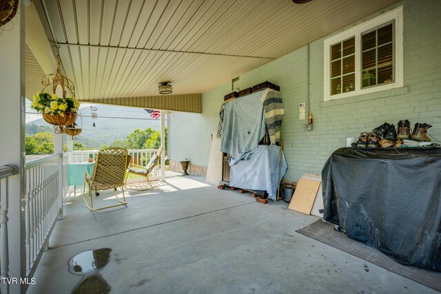 view of patio with ceiling fan