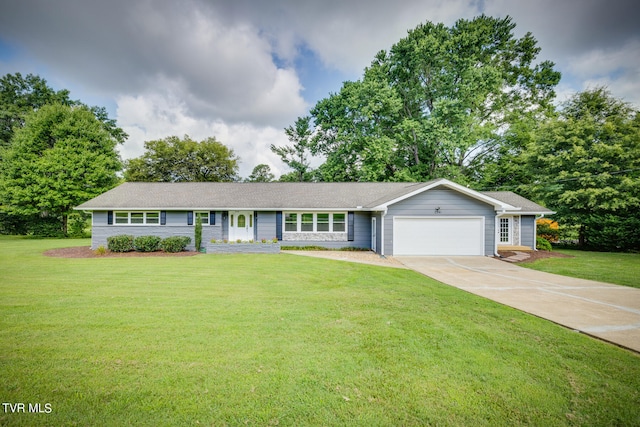 single story home featuring a garage and a front yard