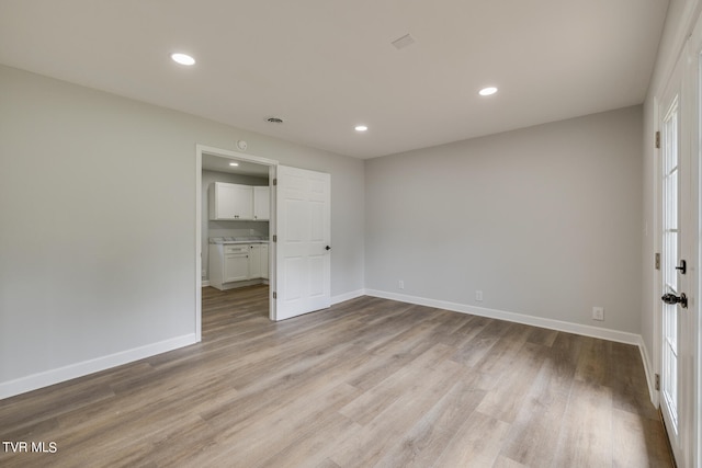 unfurnished bedroom featuring light hardwood / wood-style flooring