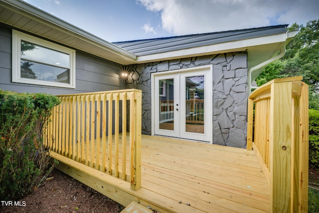 wooden terrace featuring french doors