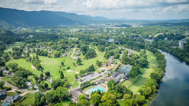 birds eye view of property featuring a water and mountain view