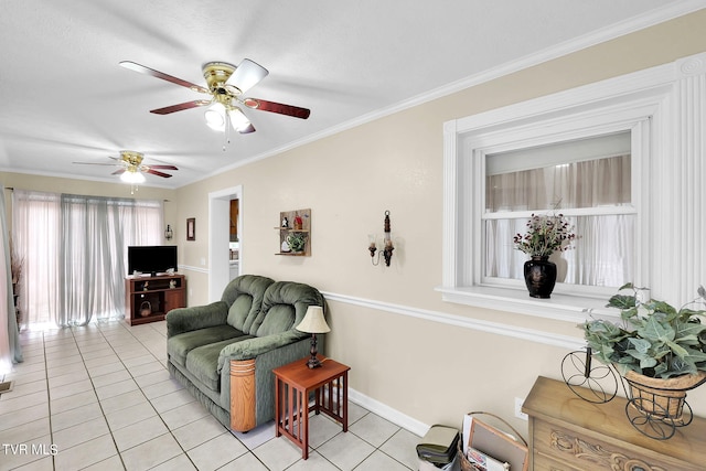 living room with ceiling fan, ornamental molding, and light tile patterned flooring