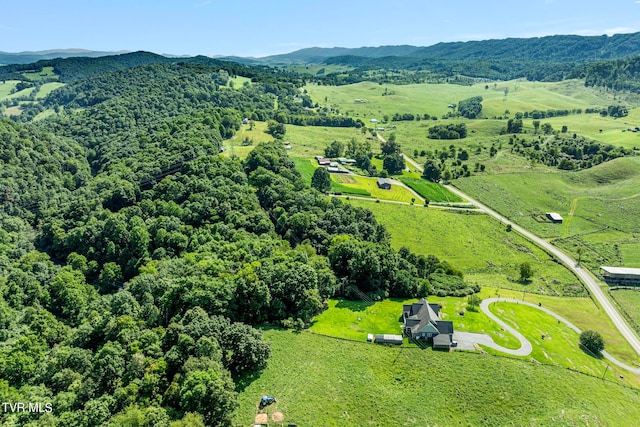 aerial view with a mountain view and a rural view