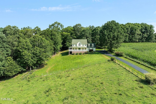 birds eye view of property featuring a rural view