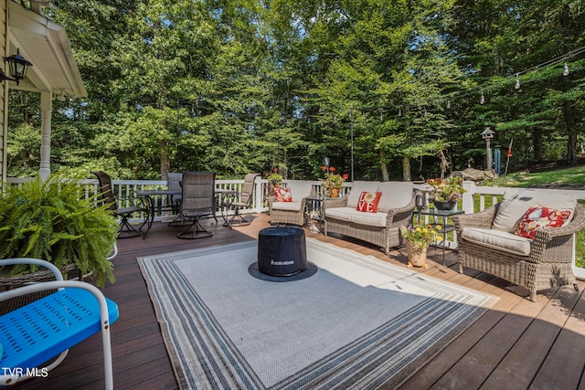 deck with an outdoor living space