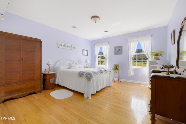 bedroom featuring light wood-type flooring