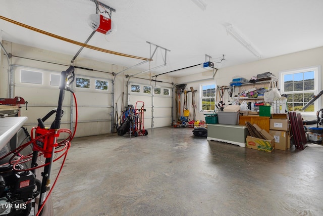 garage featuring a garage door opener