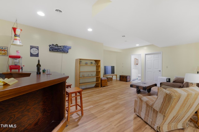 living room with light hardwood / wood-style floors