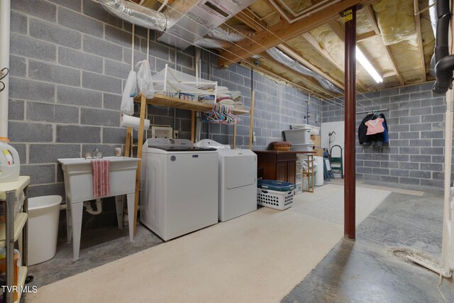 basement featuring washer and dryer