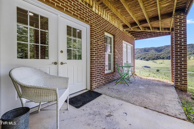 view of patio featuring a mountain view