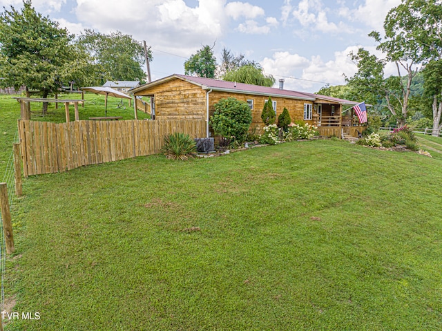 view of yard featuring fence