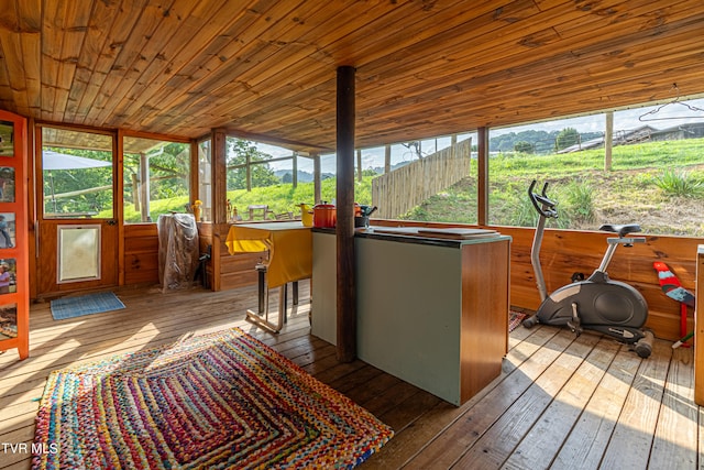 sunroom / solarium with outdoor dry bar and a wealth of natural light