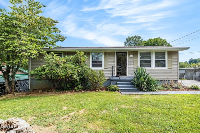 view of front of house with a front lawn