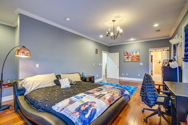 450 Lake Approach, Johnson City, TN 37601 - bedroom with baseboards, crown molding, an inviting chandelier, and hardwood / wood-style floors