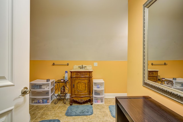 450 Lake Approach, Johnson City, TN 37601 - bathroom with baseboards, lofted ceiling, and tile patterned flooring