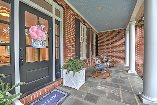 entrance to property with covered porch