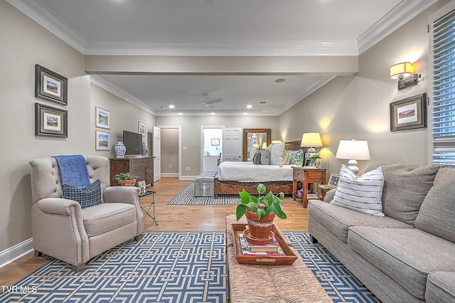 bedroom with ornamental molding and hardwood / wood-style floors