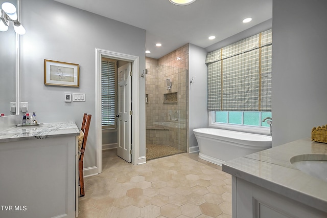 bathroom with vanity and plus walk in shower