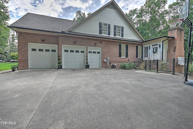 view of property exterior with a garage