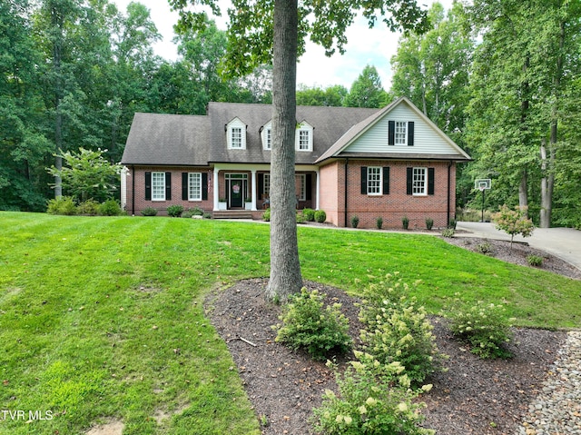 view of front of home with a front yard