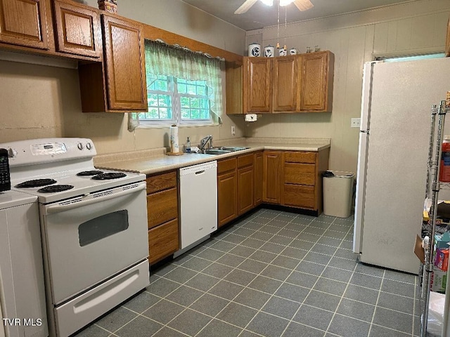 kitchen featuring sink, washer / clothes dryer, white appliances, and ceiling fan