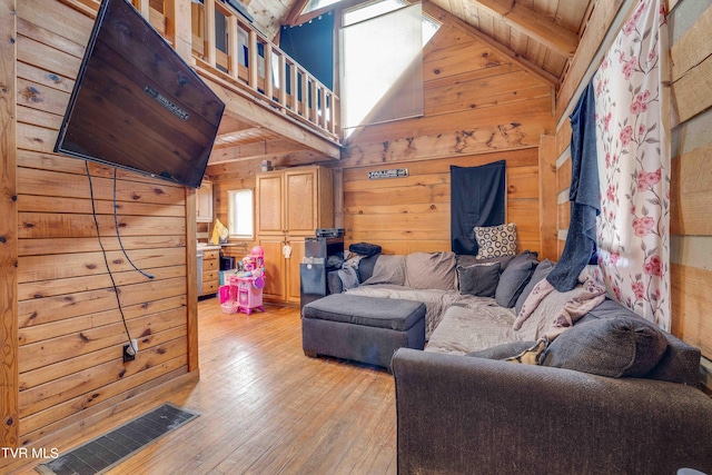 2390 W Allens Bridge Rd, Greeneville, TN 37743 - living room featuring wood walls and light wood-type flooring
