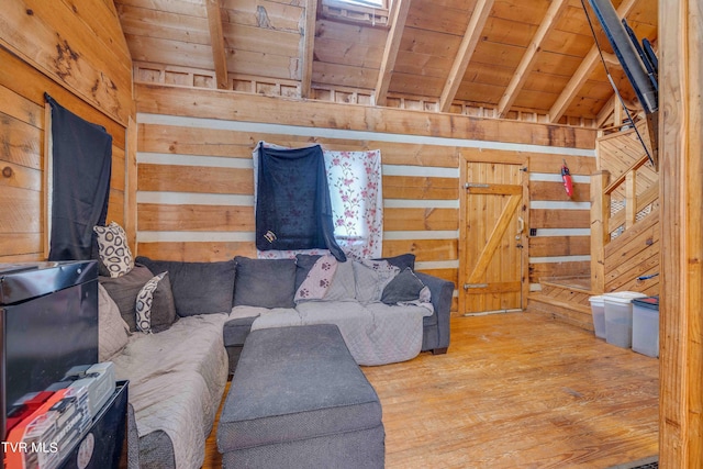 2390 W Allens Bridge Rd, Greeneville, TN 37743 - living room with wood ceiling, wooden walls, and wood finished floors