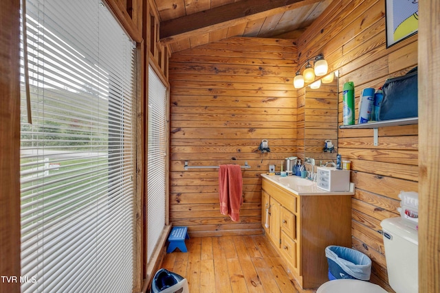 2390 W Allens Bridge Rd, Greeneville, TN 37743 - half bath with lofted ceiling, hardwood / wood-style floors, wood walls, toilet, and vanity