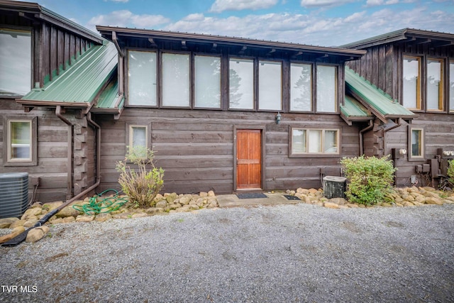2390 W Allens Bridge Rd, Greeneville, TN 37743 - back of property with central air condition unit and metal roof
