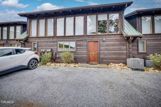 2390 W Allens Bridge Rd, Greeneville, TN 37743 - view of front of house featuring central AC and metal roof