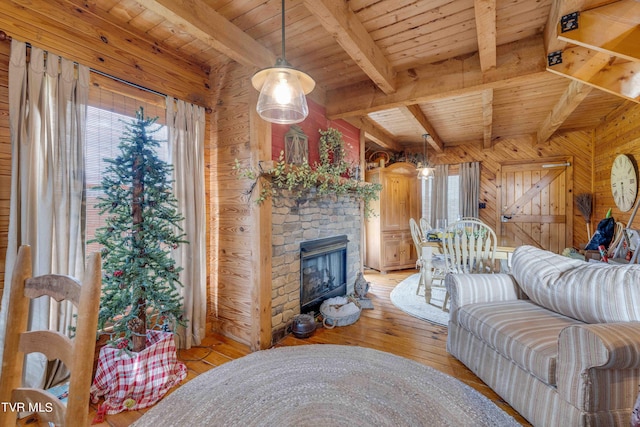 2390 W Allens Bridge Rd, Greeneville, TN 37743 - living area featuring wood ceiling, wooden walls, healthy amount of natural light, beam ceiling, and light wood-type flooring