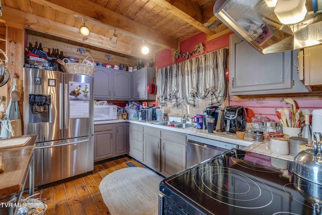 2390 W Allens Bridge Rd, Greeneville, TN 37743 - kitchen with stainless steel fridge with ice dispenser, a sink, wooden ceiling, white microwave, and tile counters
