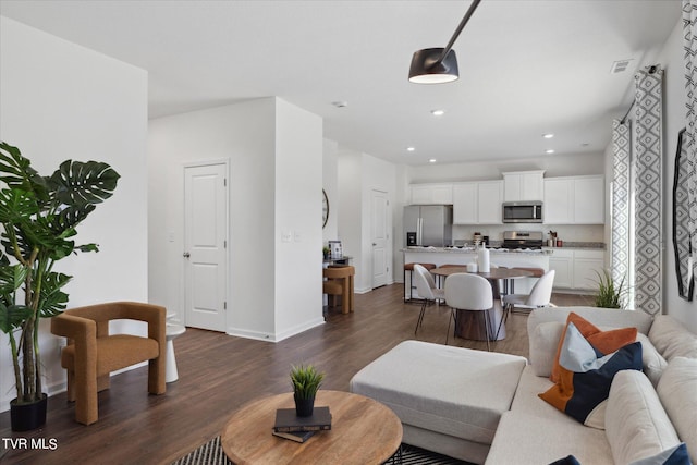 living room with dark wood-type flooring