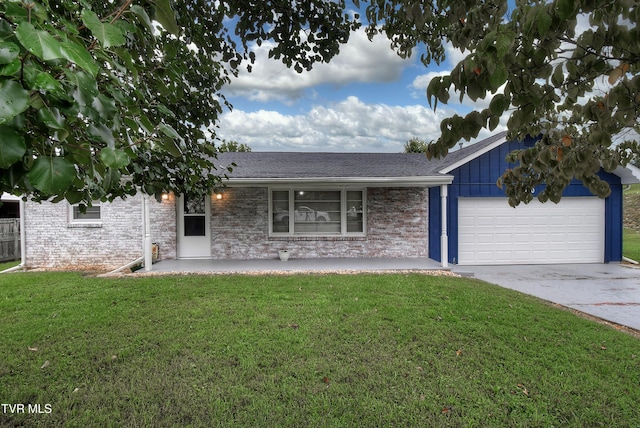 ranch-style house featuring brick siding, board and batten siding, a front lawn, a garage, and driveway